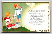 A Birthday Wish Children Filling Balloons Embossed VINTAGE Postcard picture