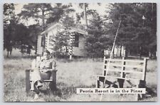 Postcard 'Peoria Resort is in The Pines' Woman, Cabin, Fishing Pole c1930s picture