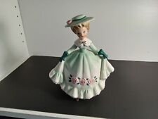 Vintage Lefton Figural Girl Planter With Green Outfit Decked Out For St.... picture