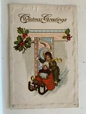 Postcard Christmas Greetings Children Sledding Embossed 1912 picture