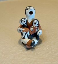 Vintage Miniature Acoma Storyteller Holding a Drum and Two Children picture