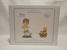 Precious Moments / 122406 / Christopher Robin Pulling Pooh / Winnie the Pooh picture