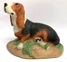 Charmstone Basset Hound, with a dog for sale tag.  Sculpted by Earl Sherwan 1984 picture