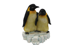 Rare Resin pair of Penguins floating on an Iceberg. 4x4x4 inches. picture