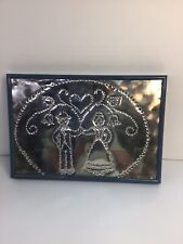 Picture, framed, metal punch picture. man& woman, hearts, design in picture. picture