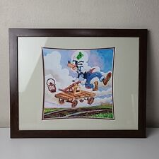 Disney Parks Randy Noble Goofy On A Hand Cart Framed Print 19.75