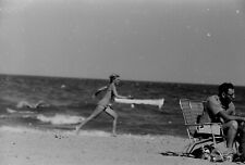 VTG 1950s 35MM NEGATIVE BEACH SCENE BLONDE RUNNING ON SAND CANDID 693-21 picture