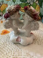 Dreamsicles  by Kristin 1996 two angels kissing figurine wear to head dress picture