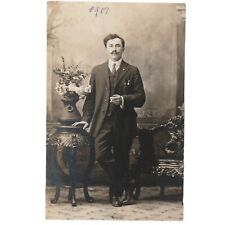 Elegant Man With Plant Stand Rppc Postcard 1907 picture