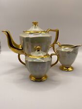 Vintage Kingwood Teapot, Creamer, & Sugar set Cream Color with Gold Trim picture