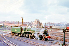 73097 in green livery @ York April 1964 BRE 452 BR Standard. picture