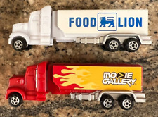 PEZ Retired Food Lion and Movie Gallery Advertising Haulers - Both Mint picture