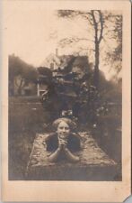 1910s RPPC Real Photo Postcard Pretty Girl in Cute Pose on Picnic Blanket / Yard picture