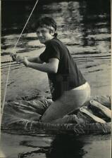 1984 Press Photo Boy Scout Chris Pye Crossing Stream in Canoe at Camp Lazynski picture