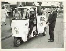 1960 Press Photo Charlotte police officer driving motorized scooter, NC picture