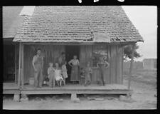 Sharecropper family on front porch of cabin,Southeast Missouri Farms,MO,FSA,1 picture