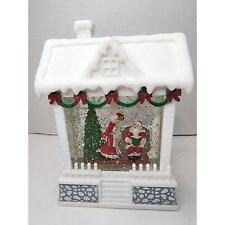 DILLARD'S Illuminated Snow House Santa Kissing Mrs Claus SEE PHOTOS AND VIDEO picture