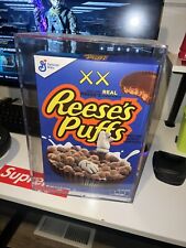 KAWS x Reese’s Puffs Blue Box Limited Edition Cereal SEALED w/ Collector Case picture