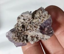 Purple Fluorite Crystal with Sphalerite crystals on one side picture