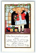 1924 Christmas Little Girl Toys Mistletoe Berries Grand Junction Iowa Postcard picture