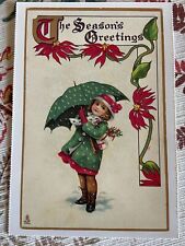 vintage Christmas postcard seasons greetings girl green umbrella dres reproduced picture