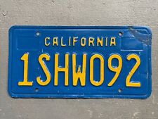 VINTAGE CALIFORNIA LICENSE PLATE  CLASSIC BLUE /YELLOW 1SHWO92 COOL😎 picture