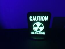 Uranium Symbol Sign Glows Under uV Reactive 3D Printed picture
