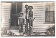 c1910's Boys Ride Bicycle House Door Scene RPPC Photo Unposted Antique Postcard picture