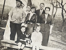 Found Snapshot Photo Family Posing Outdoors With Pet Dog picture