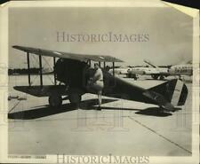 1981 Press Photo Lt. Col. Kimbrough Brown with World War I fighter, Hanscom base picture