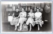 1952 RPPC SALOON WOMEN SITTING ON BAR NO PARKING HUMOROUS STUDIO POSTCARD picture
