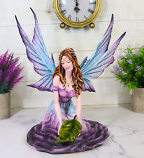 Large Whimsical Purple Rose Fairy With Large Leaf Kneeling On Flower Figurine picture