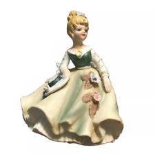 Vintage porcelain figurine woman girl holding Hat. Green Southern  Bell Dress picture