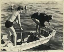1936 Press Photo Lifeguards Cecil Holden and Al Ericson in Boat at Training picture