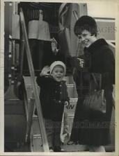 1968 Press Photo Irmgard Shepard & son boarding an airplane in New York picture