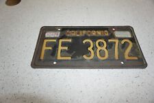 1963 California License Plate oos w/chipping paint yellow on black picture