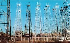 Kilgore TX East Texas Oil Field Wells Derricks Skyline Vtg Postcard C47 picture