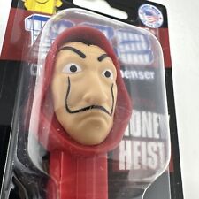 MONEY HEIST PEZ - REGULAR RED CAPED VERSION - MINT ON US CARD SALVADOR DALI picture