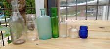 Lot of 7 Antique Small Embossed / Unembossed Bottles picture