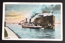 Docking a Lake Freighter Ship Tugboat Erie Pennsylvania Postcard c1920s (Crease) picture