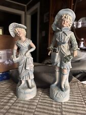 Vintage Boy And Girl German Bisque Porcelain Statues picture