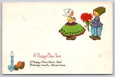Holiday~Boy Giving Girl Poinsettias New Year Greeting~Vintage Postcard picture