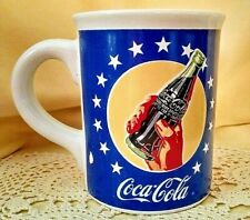 COKE MUG STARS STRIPES RED WHITE BLUE COCA COLA BOTTLE GIBSON 2002 USED CUP. picture