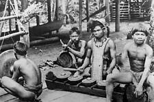Traditional musicians in Kalimantan Borneo Indonesia 1920 Old Photo picture