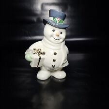 Lenox Figurine - Ivory Snowman With a Top Hat Carrying a Gift picture