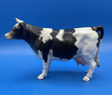 VINTAGE CERAMIC FIGURINE OF A HOLSTEIN COW, MODEL E103 picture