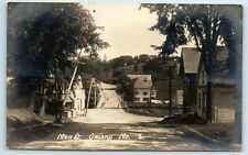 Postcard Main Street, Orland, Maine bridge leaning power lines RPPC A193 picture