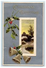 1909 Christmas Greetings Holly Bells Winter Snow Hut Embossed Antique Postcard picture