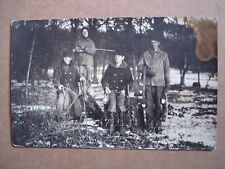 postcard RPPC of 4 people (family?) hunting rabbits before 1915.  Albert Lea, MN picture