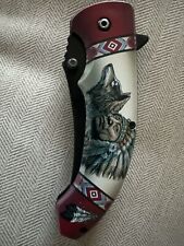 Snake eye Indian With Wolf pocket knife picture